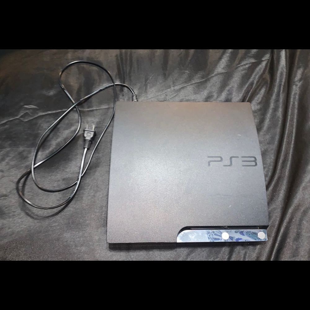 Like new. Sony PlayStation 3 (PS3) Slim Design.